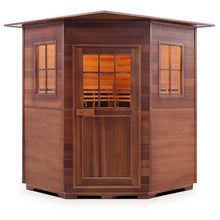 Wooden infrared sauna with glass door and windows, featuring a sleek modern design.