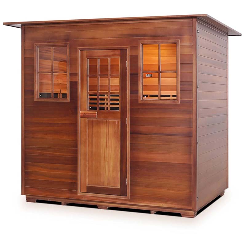 Outdoor cedar sauna cabin with large windows and a modern design.