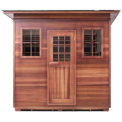 Cedar sauna with two windows and a central door, featuring rich wood tones for outdoor relaxation.