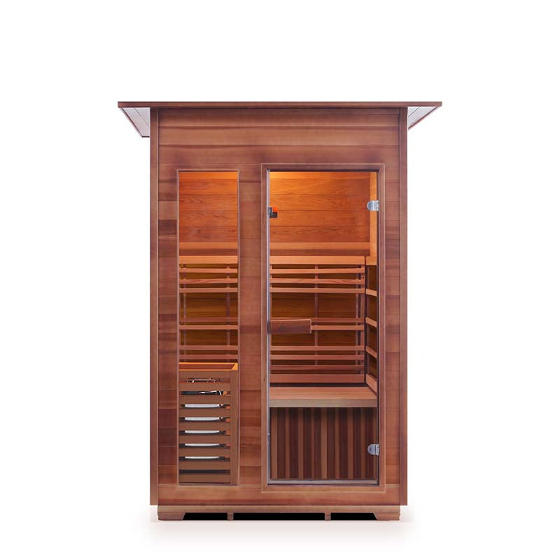 Two-person cedar infrared sauna with glass door and warm interior lighting.
