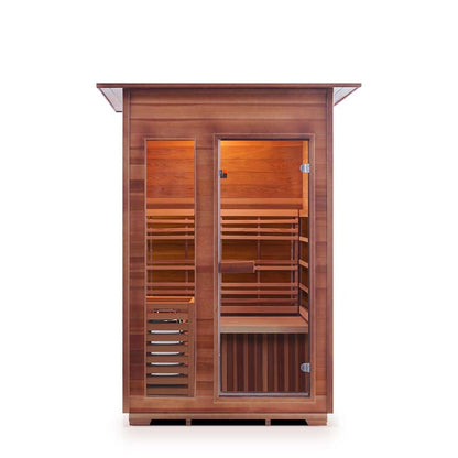 Two-person cedar infrared sauna with glass door and warm interior lighting.