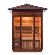Outdoor infrared sauna with cedar wood and glass door design.