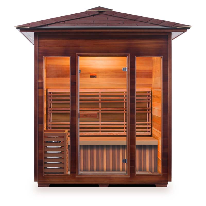 Outdoor infrared sauna with cedar wood panels and glass doors.