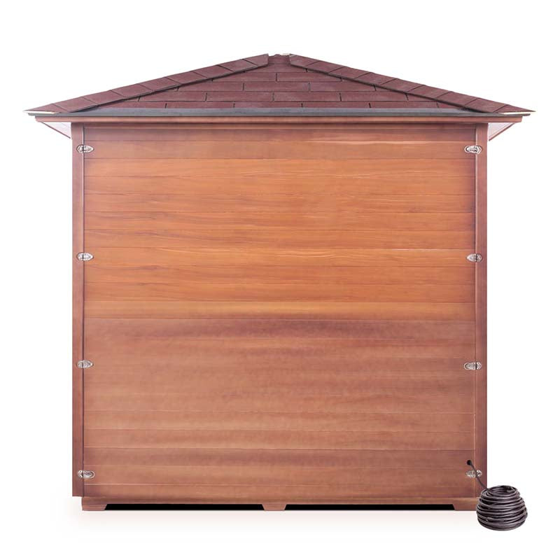 Wooden sauna with a shingled roof and a black coiled heater on the side.