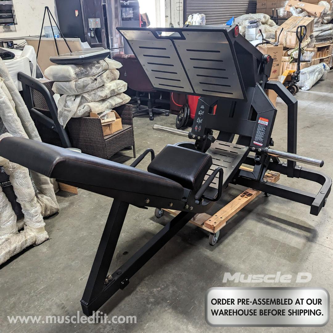 Excel Leverage Leg Press machine in a gym with padded seat and footplate.