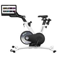 Freebeat Boom Stationary Exercise Bike featuring a sleek design and a digital display for interactive workouts.
