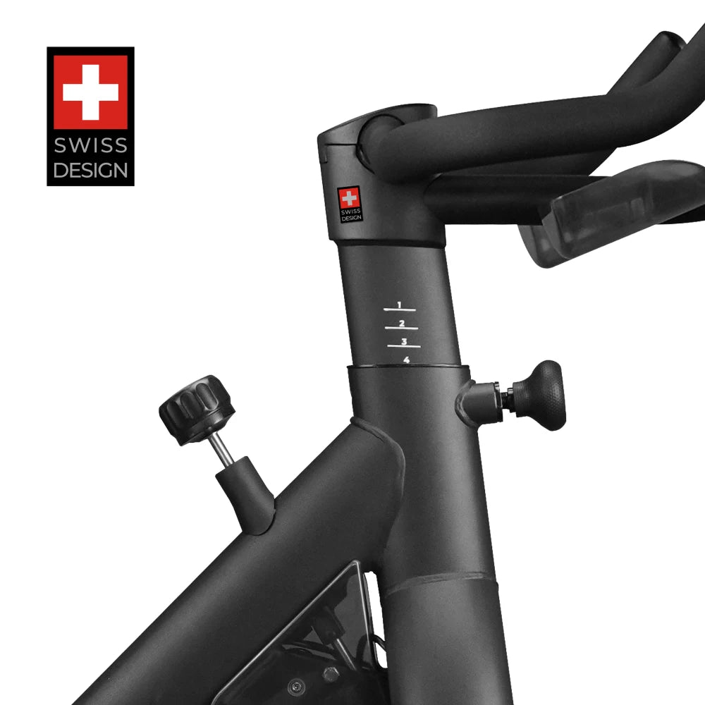 Black Swiss Design indoor bike with adjustable handlebar.