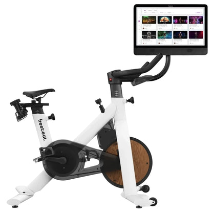 Freebeat Lit Stationary Exercise Bike featuring a sleek white design and a large display screen for interactive workouts.