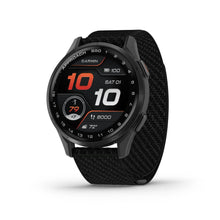 Garmin Approach S50 smartwatch displaying fitness metrics and time on a black fabric strap.