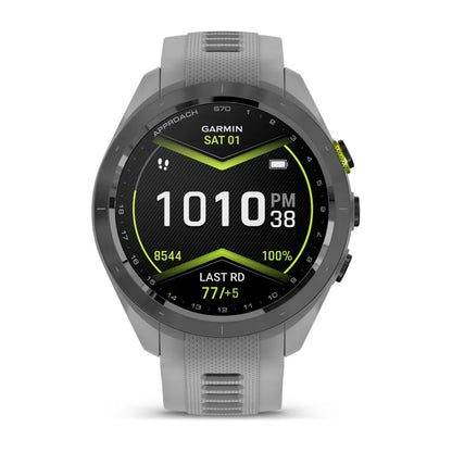 Garmin Approach S70 smartwatch displaying time, steps, battery percentage, and last round statistics on a black and green watch face.