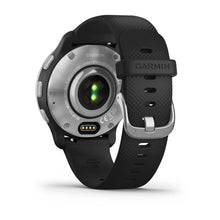 Back view of the Garmin D2 Air X10 smartwatch, showcasing the stainless steel case, black strap, and heart rate sensor.