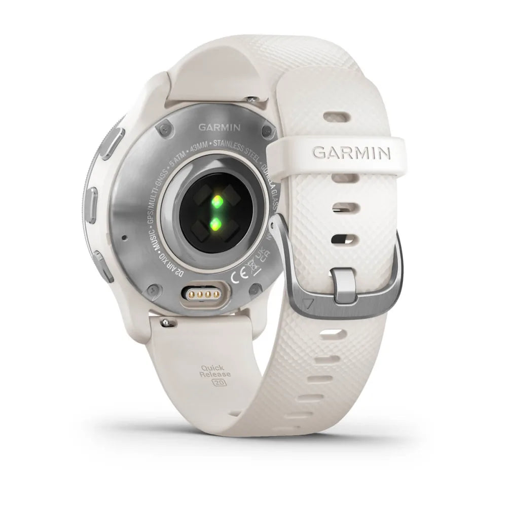 Back view of the Garmin D2 Air X10 smartwatch, featuring a stainless steel case and a white strap, showcasing the sensors and charging contacts.