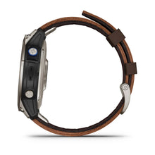 Garmin D2 Mach 1 smartwatch with a brown leather strap, viewed from the side showing buttons and design details.