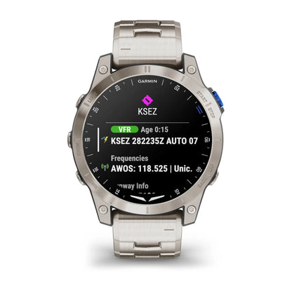 Garmin D2 Mach 1 smartwatch displaying aviation data including airport code KSEZ, VFR status, age, and frequencies on a black screen with a metallic strap.