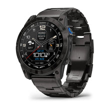 Close-up of the Garmin D2 Mach 1 Pro smartwatch displaying various digital functions, including weather information and time, with a sleek black metal strap.