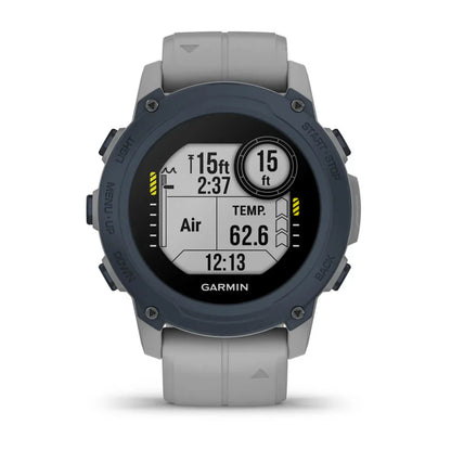 Garmin Descent G1 dive watch displaying depth, temperature, and time information on its screen.