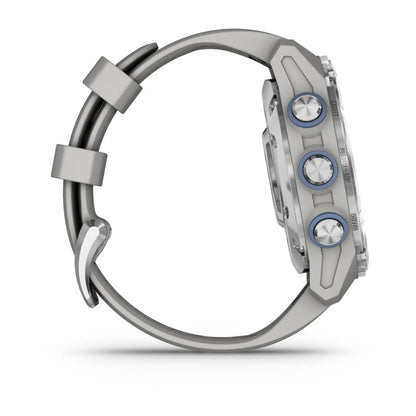 Side view of the Garmin Descent Mk3 smartwatch featuring a sleek design with three buttons and a gray silicone strap.