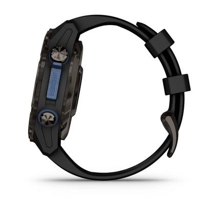 Garmin Descent Mk3i smartwatch shown from the side, featuring a black and gray design with a blue accent on the display.
