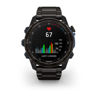 Garmin Descent Mk3i smartwatch displaying heart rate of 67 and a colorful graph representing data from the last 4 hours.