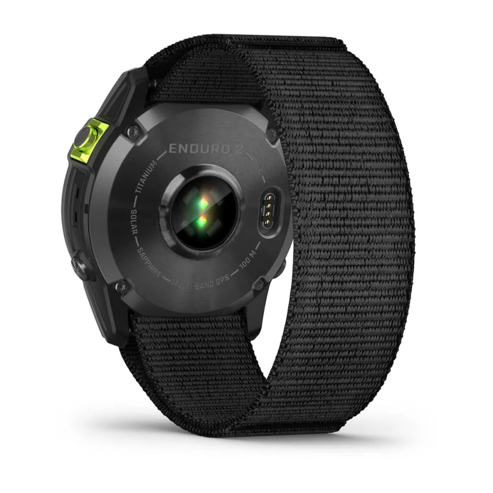 Back view of the Garmin Enduro 2 smartwatch featuring a titanium case, solar charging capability, and a black fabric strap.