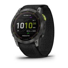 Garmin Enduro 2 smartwatch displaying various metrics, including VO2 max, time, and a productive status, with a black fabric strap.