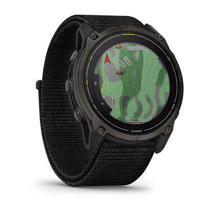 Garmin Enduro 3 smartwatch displaying a detailed topographic map on its screen, featuring a black fabric strap.