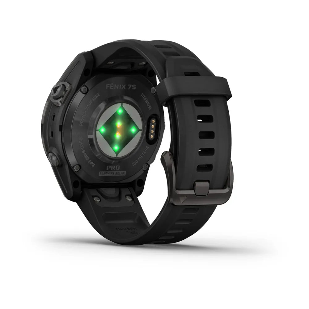 Garmin Fenix 7S Pro Sapphire Solar Edition smartwatch showing the back view with a black strap and green sensors illuminated.