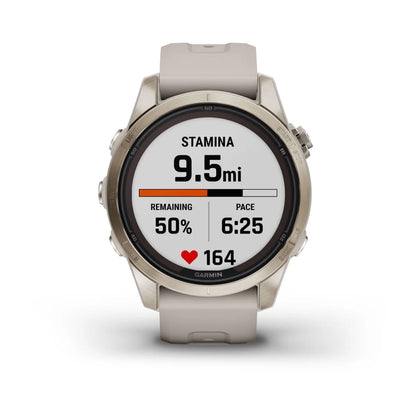 Garmin Fenix 7S Pro Sapphire Solar Edition smartwatch displaying stamina information with a remaining distance of 9.5 miles, 50% stamina left, pace of 6:25, and heart rate of 164.