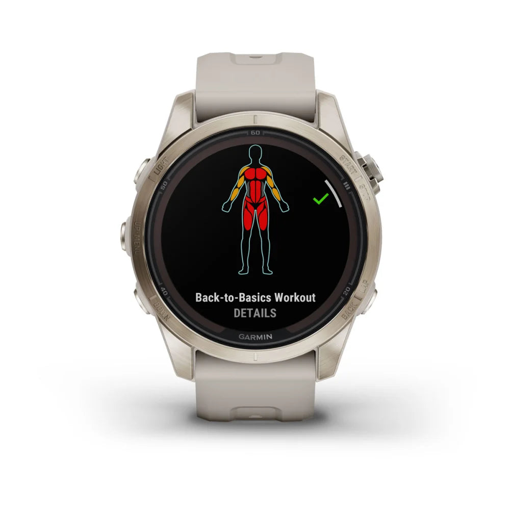 Garmin Fenix 7S Pro Sapphire Solar Edition displaying a 'Back-to-Basics Workout' screen with a graphic of a human figure highlighting muscle groups.