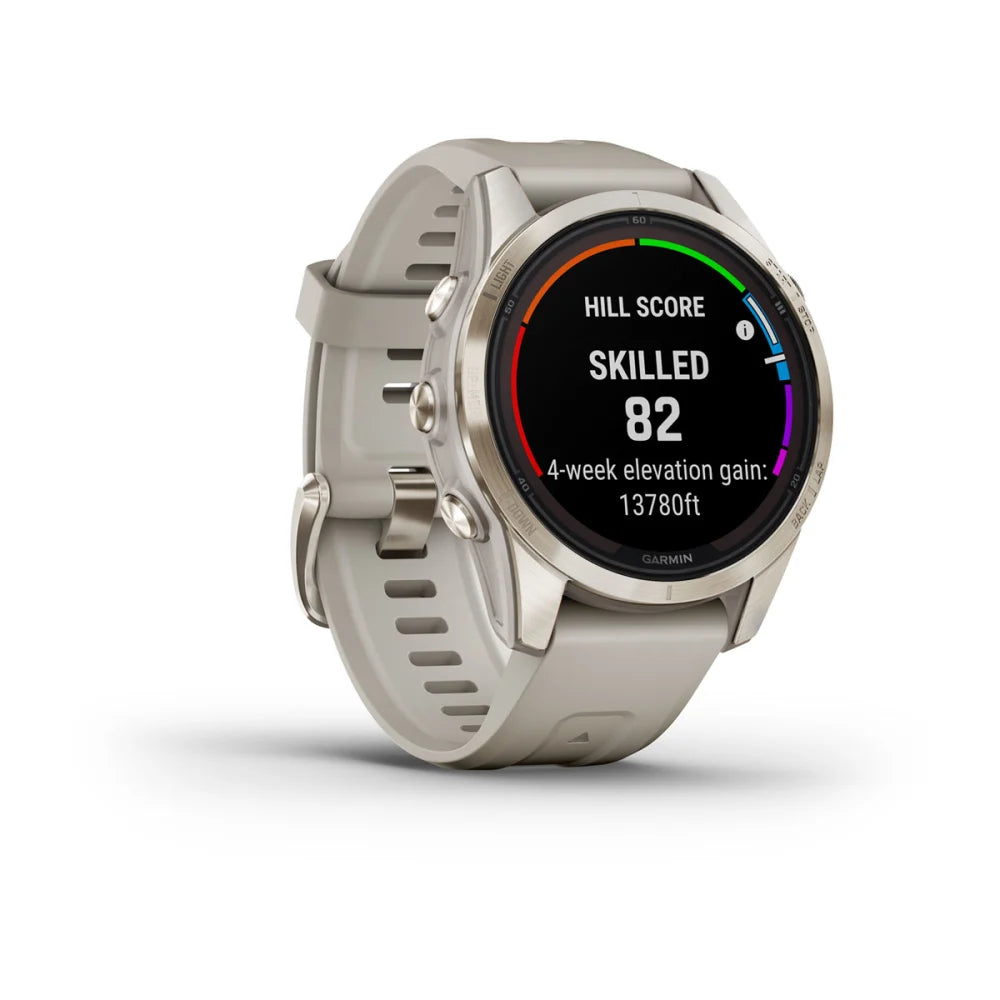 Garmin Fenix 7S Pro Sapphire Solar Edition smartwatch displaying a hill score of 82, with a four-week elevation gain of 13,780 feet on its screen.
