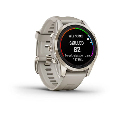 Garmin Fenix 7S Pro Sapphire Solar Edition smartwatch displaying a hill score of 82, with a four-week elevation gain of 13,780 feet on its screen.