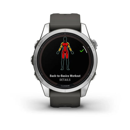 Garmin Fenix 7S Pro Solar Edition displaying a 'Back-to-Basics Workout' screen with a graphic of a human figure highlighting muscle groups.