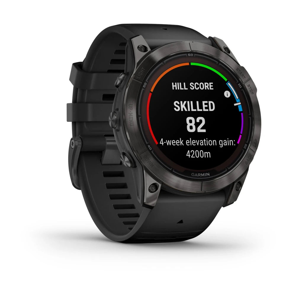 Garmin Fenix 7X Pro Sapphire Solar Edition smartwatch displaying hill score, skilled level, and 4-week elevation gain statistics.