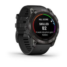 Garmin Fenix 7X Pro Sapphire Solar Edition smartwatch displaying hill score, skilled level, and 4-week elevation gain statistics.
