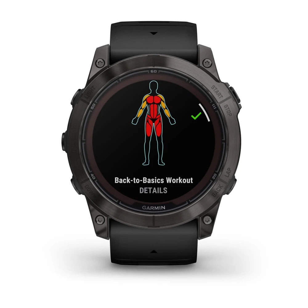 Garmin Fenix 7X Pro Sapphire Solar Edition displaying a Back-to-Basics Workout screen with a graphic of a human body highlighting muscle groups.