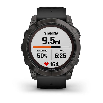 Garmin Fenix 7X Pro Sapphire Solar Edition smartwatch displaying stamina at 9.5 miles, remaining 50%, pace 6:25, and heart rate 164.