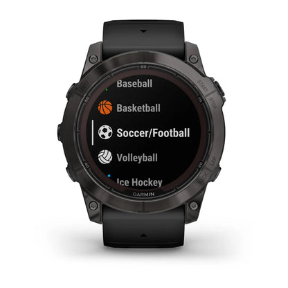 Garmin Fenix 7X Pro Sapphire Solar Edition displaying various sports options including Baseball, Basketball, Soccer/Football, Volleyball, and Ice Hockey.