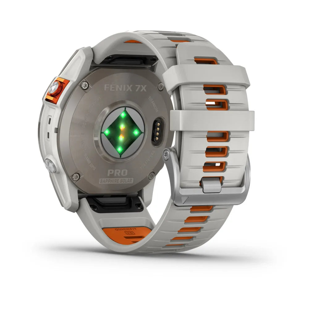 Back view of the Garmin Fenix 7X Pro Sapphire Solar Edition smartwatch, showcasing the sensor and white strap with orange accents.