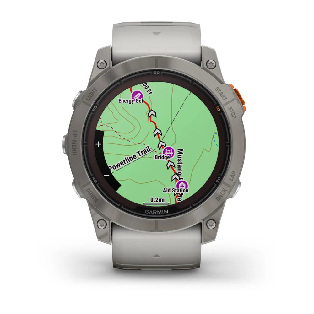 Garmin Fenix 7X Pro Sapphire Solar Edition smartwatch displaying a detailed map with trails, including Powerline Trail and nearby aid stations.