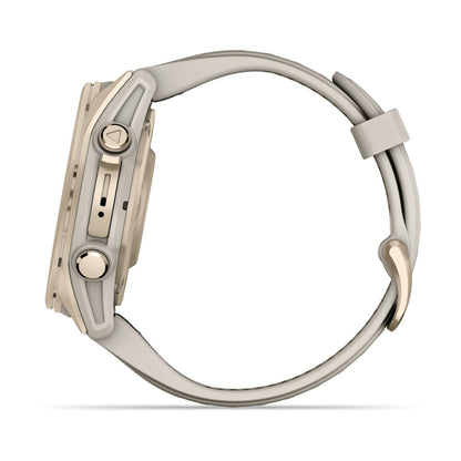 Garmin Fenix 8 AMOLED Edition smartwatch viewed from the side, featuring a sleek design with gold and light gray colors.