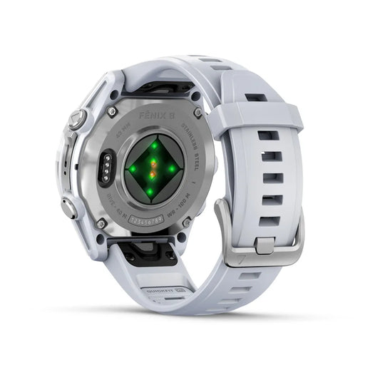 Back view of the Garmin Fenix 8 AMOLED Edition smartwatch, featuring a white strap and a heart rate sensor with green lights.