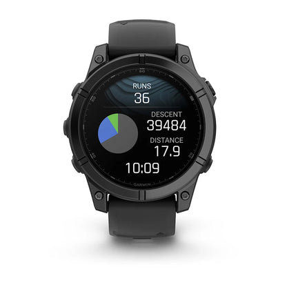 Garmin Fenix E AMOLED Edition smartwatch displaying metrics including runs, descent, distance, and time.