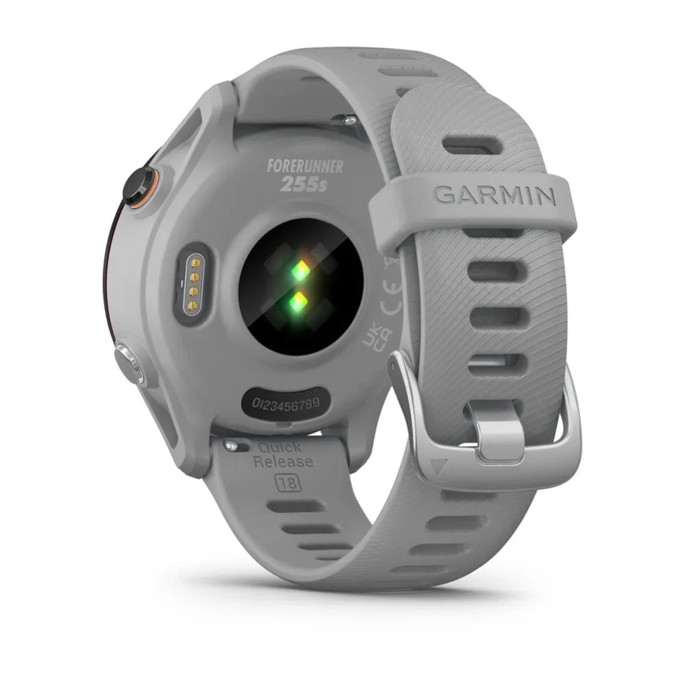 Back view of a Garmin Forerunner 255S smartwatch with a gray strap, showcasing the heart rate sensor and quick release feature.