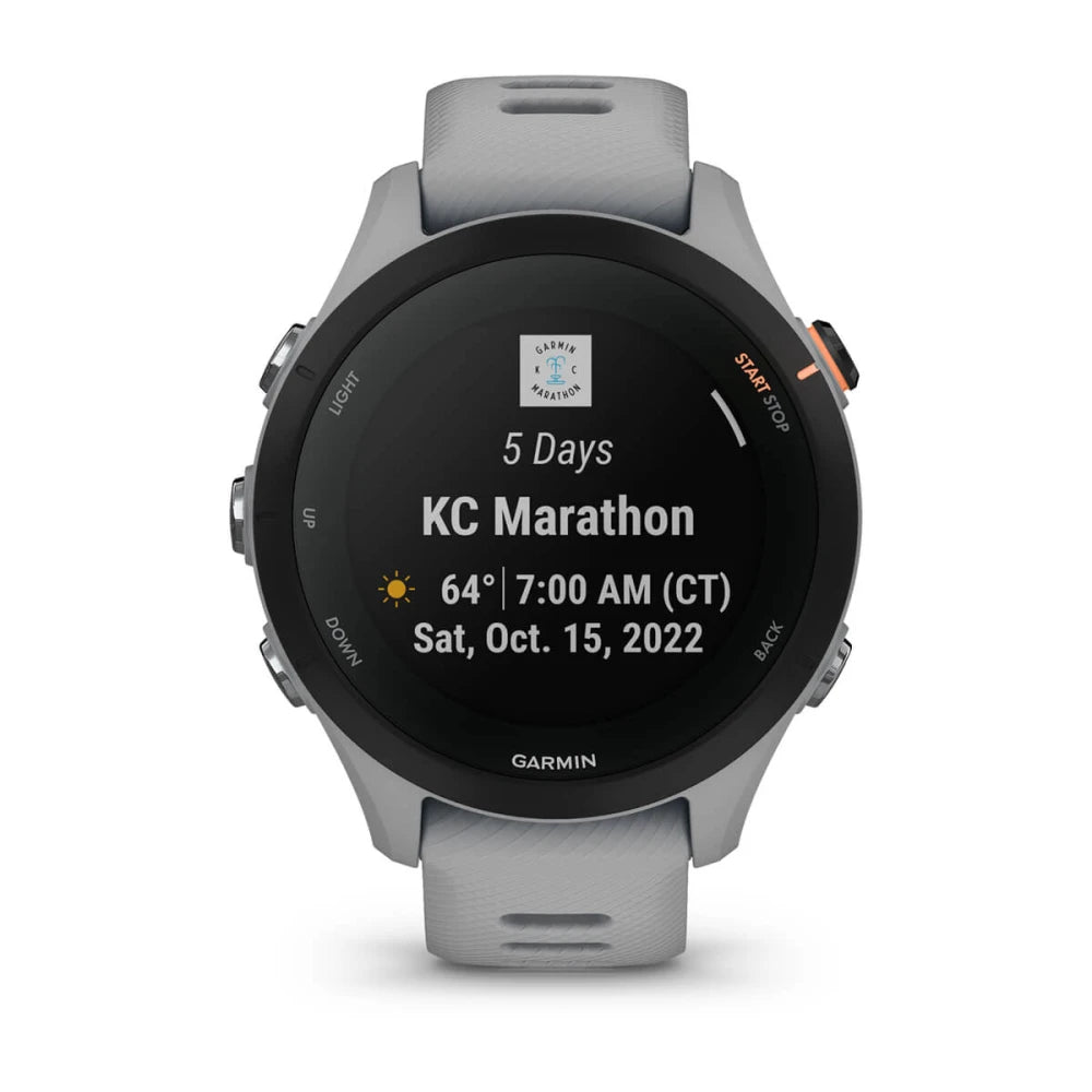 Garmin Forerunner 255S displaying a countdown for the KC Marathon with details including temperature, time, and date.