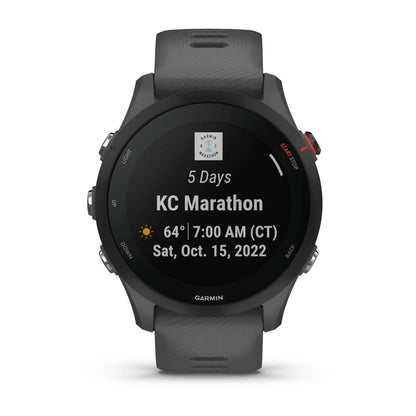 Garmin Forerunner 255 displaying a countdown for the KC Marathon with details including '5 Days', temperature, time, and date.