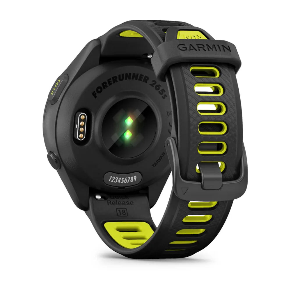 Garmin Forerunner 265S smartwatch with a black and yellow strap, showcasing the back view with sensors and charging port.
