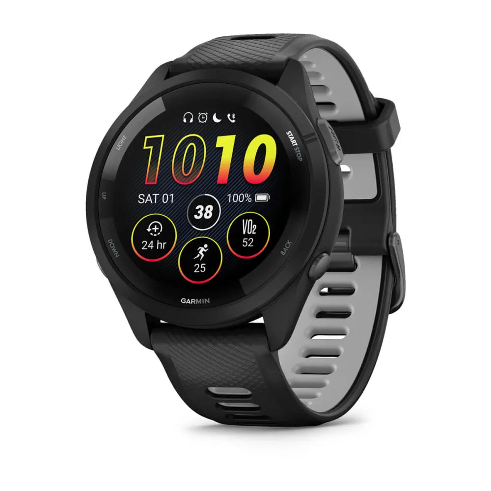 Garmin Forerunner 265 smartwatch displaying various fitness metrics and the date on its colorful screen.