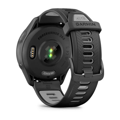 Back view of the Garmin Forerunner 265 smartwatch showing the sensor and charging port.