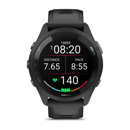 Garmin Forerunner 265 smartwatch displaying timer, distance of 7.65 miles, pace of 8:55 per mile, and heart rate of 140 bpm.