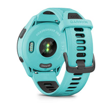 Garmin Forerunner 265 smartwatch in turquoise color, showing the back view with heart rate sensor and adjustable strap.